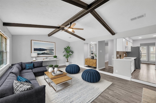 3048 Gessner Rd, Houston, TX 77080 - living area featuring light wood-style flooring, baseboards, a ceiling fan, and recessed lighting