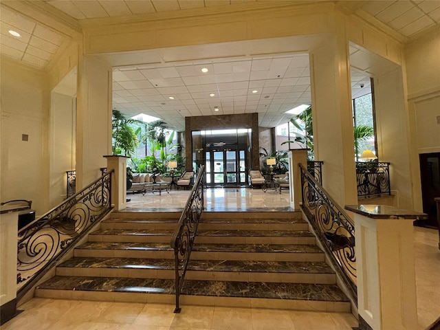 interior space featuring ornamental molding, recessed lighting, and a healthy amount of sunlight