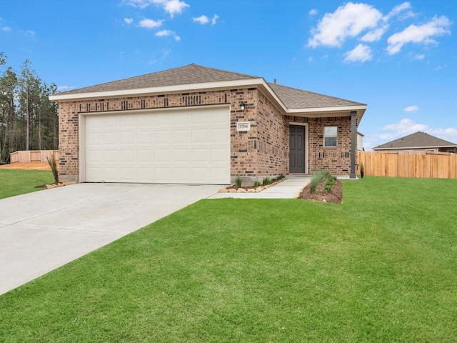 ranch-style home with an attached garage, brick siding, fence, concrete driveway, and a front yard