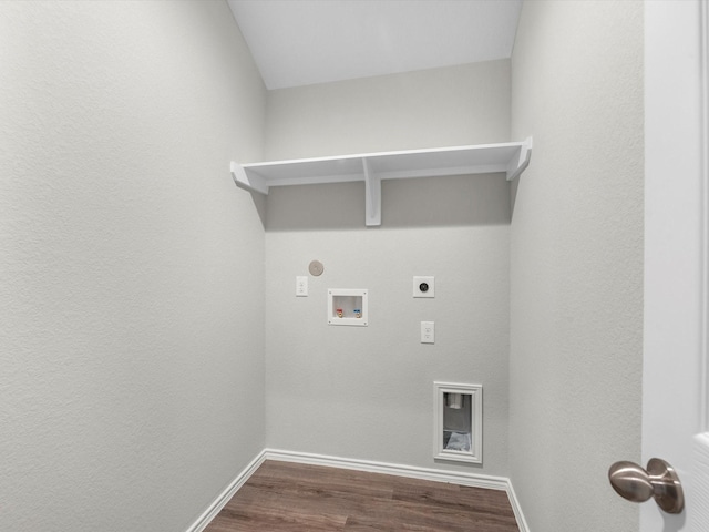 washroom featuring hookup for a gas dryer, hookup for an electric dryer, laundry area, dark wood-type flooring, and washer hookup