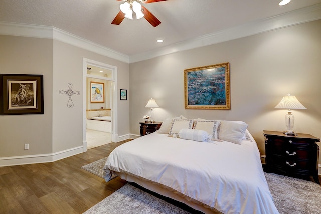 37314 Edgewater Dr, Pinehurst, TX 77362 - bedroom with wood finished floors, ornamental molding, baseboards, recessed lighting, and ensuite bathroom
