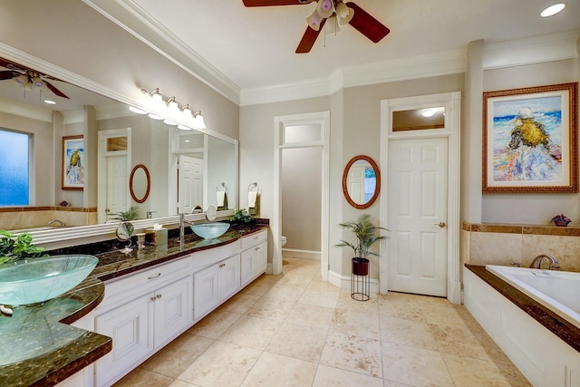 37314 Edgewater Dr, Pinehurst, TX 77362 - full bath with a ceiling fan, crown molding, double vanity, a bath, and toilet