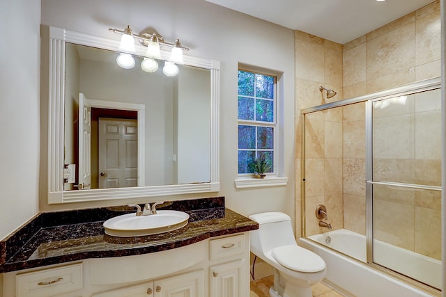 37314 Edgewater Dr, Pinehurst, TX 77362 - bathroom with enclosed tub / shower combo, toilet, and vanity