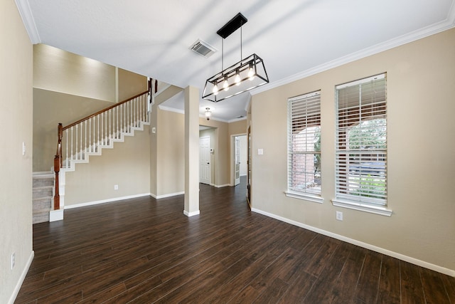 interior space with crown molding, dark wood finished floors, visible vents, baseboards, and stairs