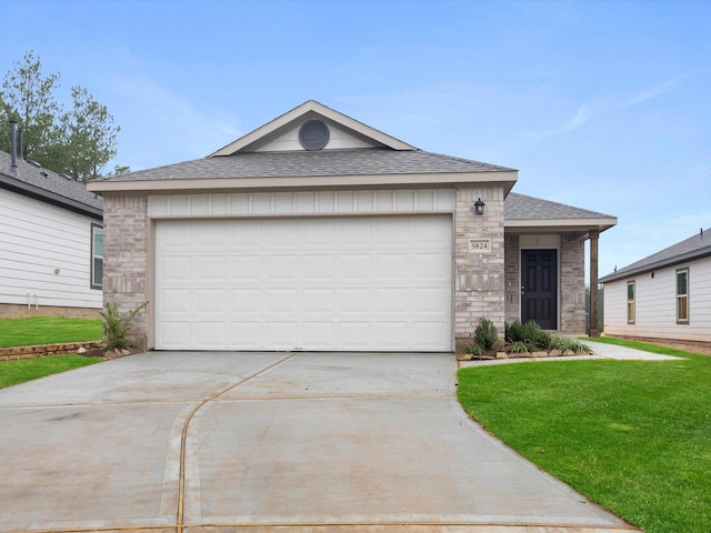 ranch-style house featuring a garage, a shingled roof, brick siding, concrete driveway, and a front lawn