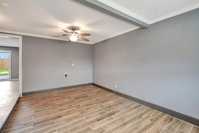 unfurnished room featuring ornamental molding, wood tiled floor, ceiling fan, and baseboards