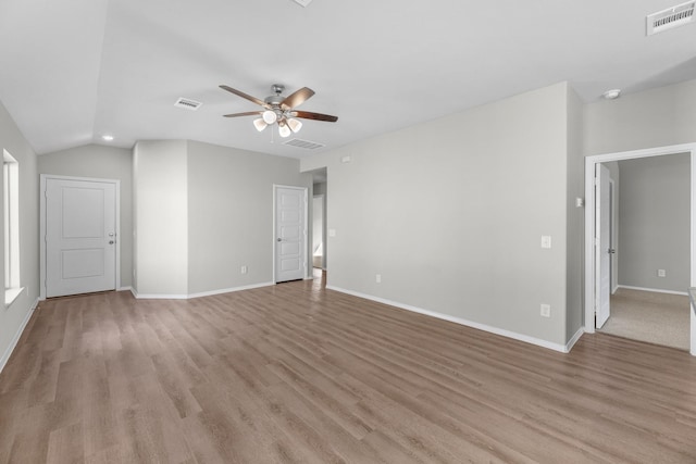 unfurnished living room featuring visible vents and light wood-style flooring