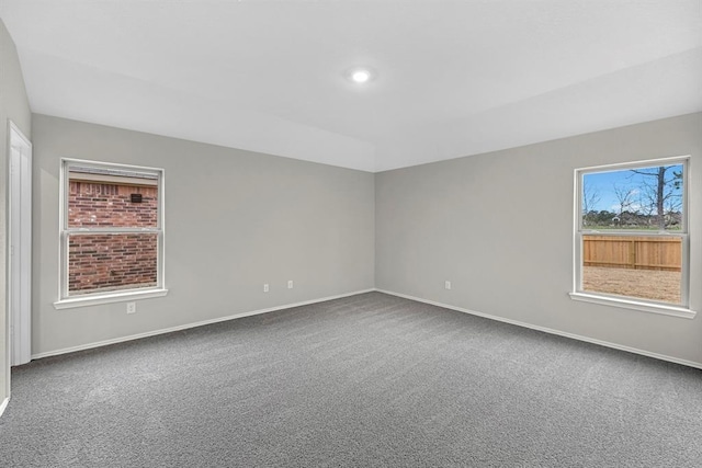 carpeted spare room with baseboards and recessed lighting