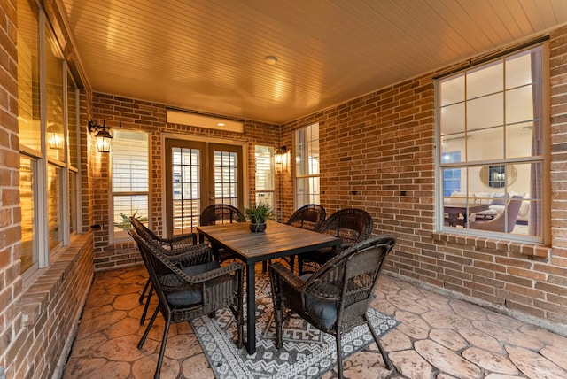 view of patio / terrace featuring outdoor dining space and french doors