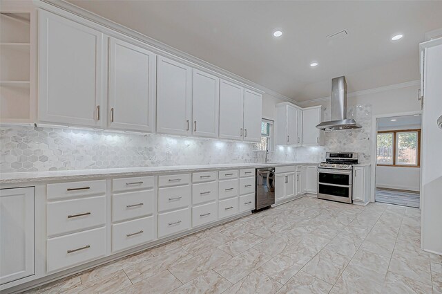 kitchen with ornamental molding, white cabinets, wall chimney range hood, double oven range, and dishwasher