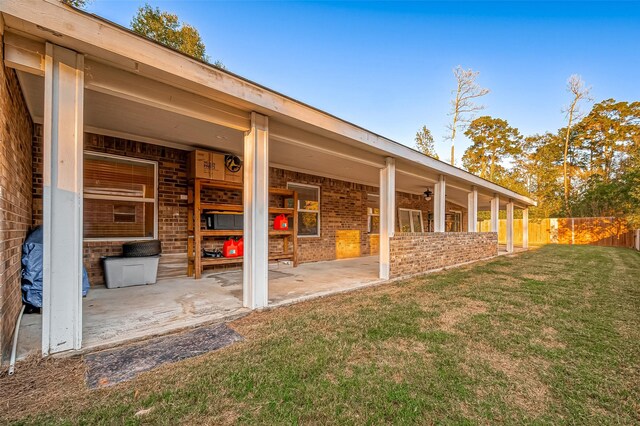 exterior space featuring fence and a patio