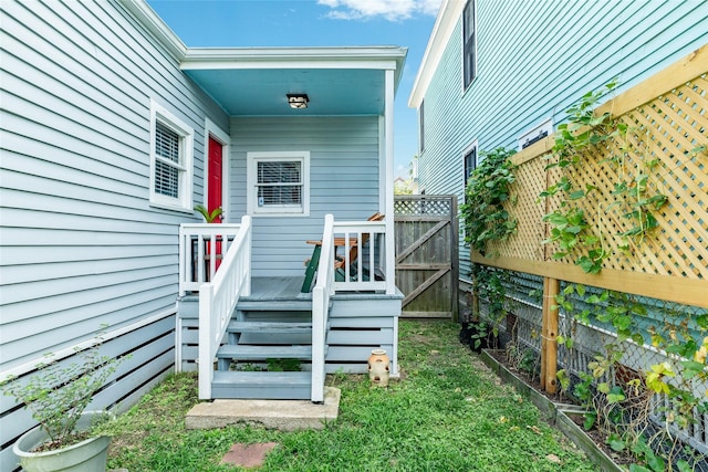 property entrance with fence