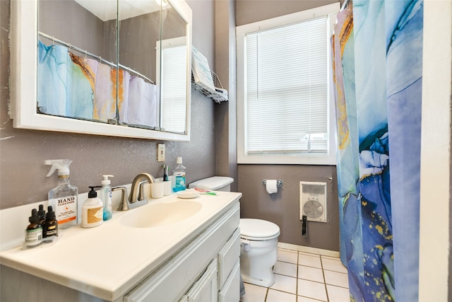 full bath featuring a textured wall, toilet, a shower with shower curtain, tile patterned floors, and vanity