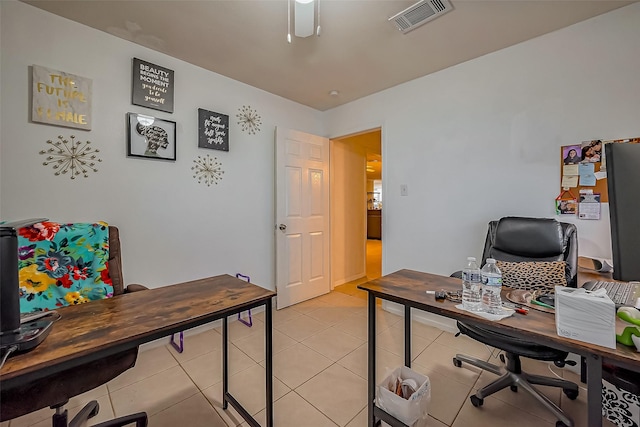 office space with light tile patterned floors and visible vents