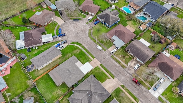 birds eye view of property with a residential view