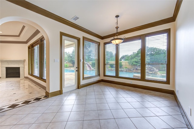 interior space featuring visible vents, crown molding, and baseboards