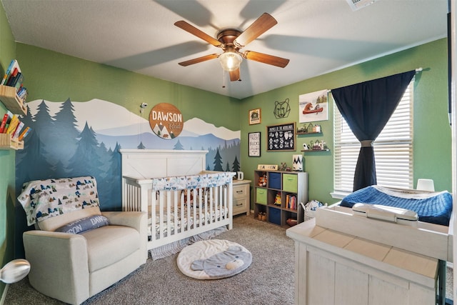 bedroom with a ceiling fan and light colored carpet