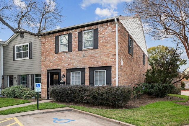 view of front of property with brick siding