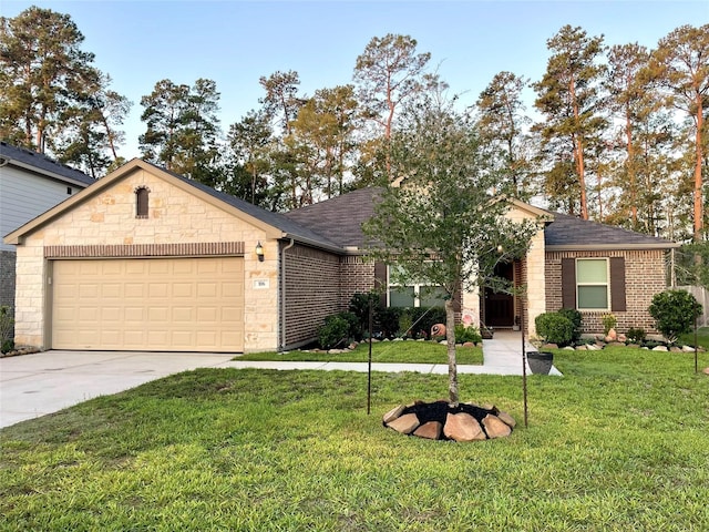 ranch-style home featuring a garage, driveway, brick siding, and a front lawn