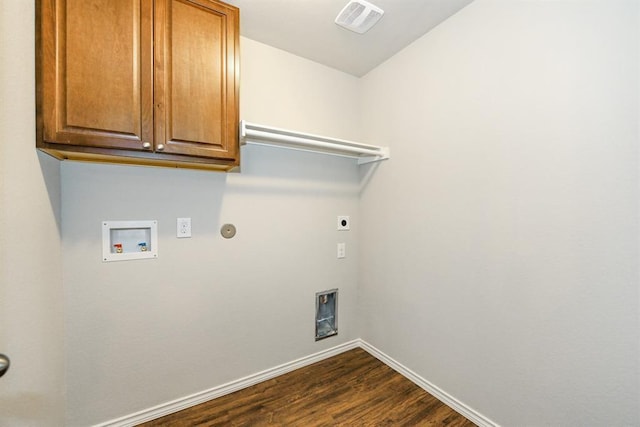 laundry area with visible vents, dark wood finished floors, baseboards, washer hookup, and electric dryer hookup