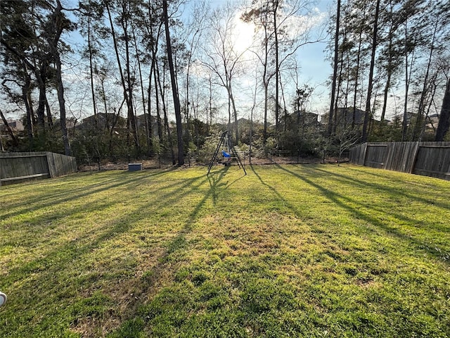 view of yard featuring a fenced backyard