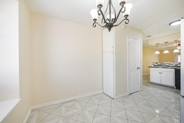 unfurnished dining area with light tile patterned flooring, visible vents, baseboards, and an inviting chandelier