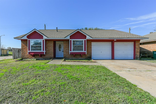 ranch-style home featuring an attached garage, a shingled roof, fence, driveway, and a front yard