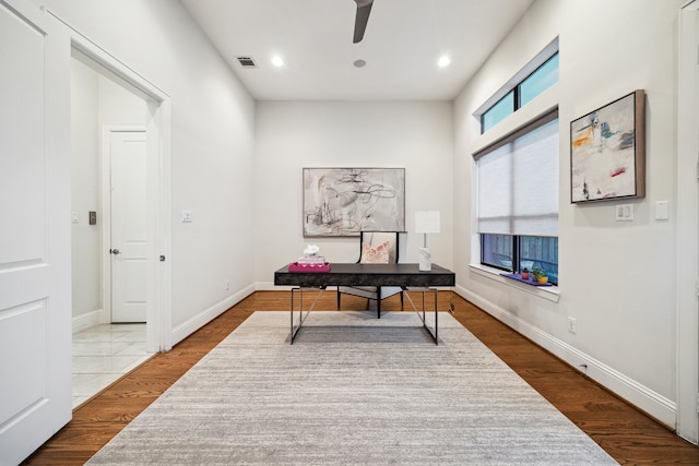 office with recessed lighting, visible vents, baseboards, and wood finished floors