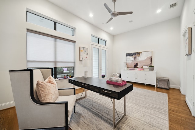 office featuring french doors, wood finished floors, visible vents, and recessed lighting