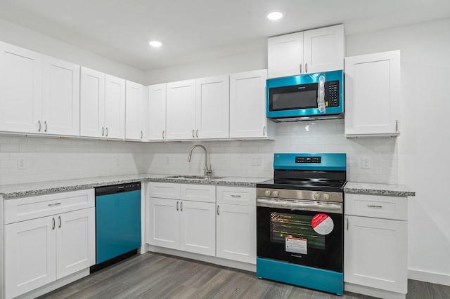 kitchen featuring dishwashing machine, a sink, white cabinetry, dark wood finished floors, and stainless steel range with electric stovetop