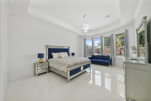 bedroom featuring baseboards, a tray ceiling, visible vents, and tile patterned floors