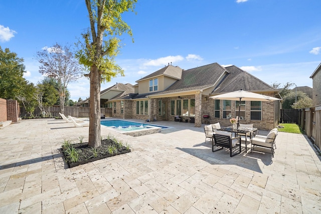 view of pool featuring a patio area, a fenced backyard, and a fenced in pool