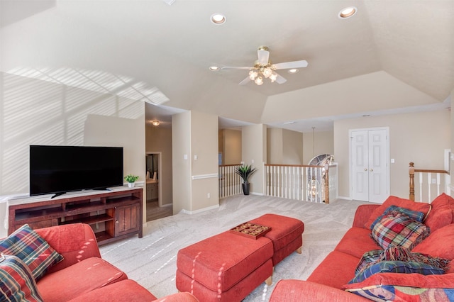 living room featuring recessed lighting, lofted ceiling, light colored carpet, ceiling fan, and baseboards