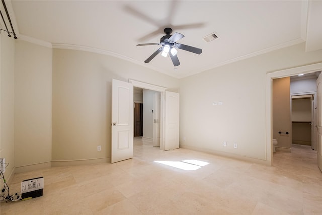 unfurnished bedroom featuring visible vents, crown molding, and baseboards