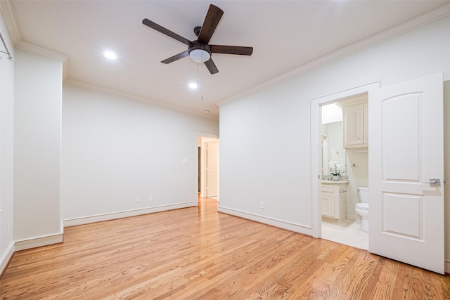 unfurnished bedroom with connected bathroom, crown molding, baseboards, recessed lighting, and light wood-style flooring