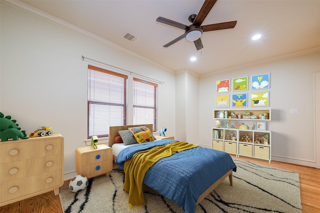 bedroom featuring visible vents, wood finished floors, recessed lighting, crown molding, and ceiling fan