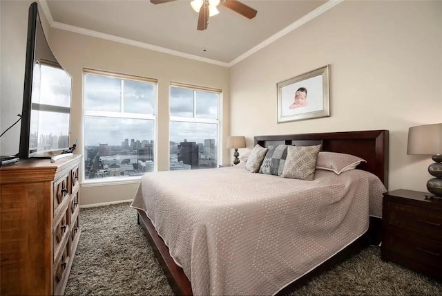 bedroom with multiple windows, dark carpet, and crown molding