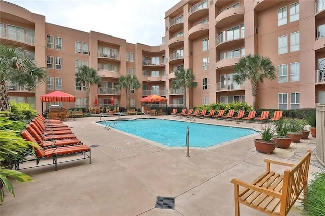 pool with a patio area