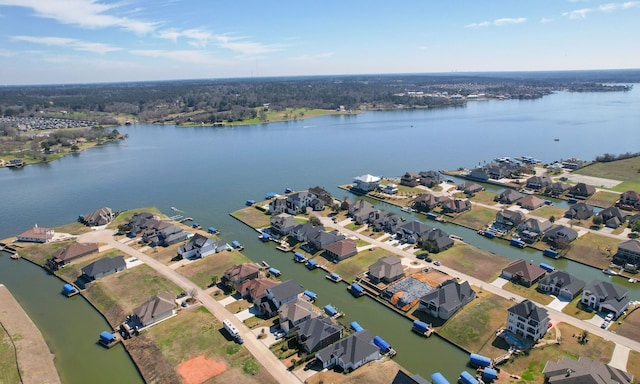 aerial view with a residential view and a water view