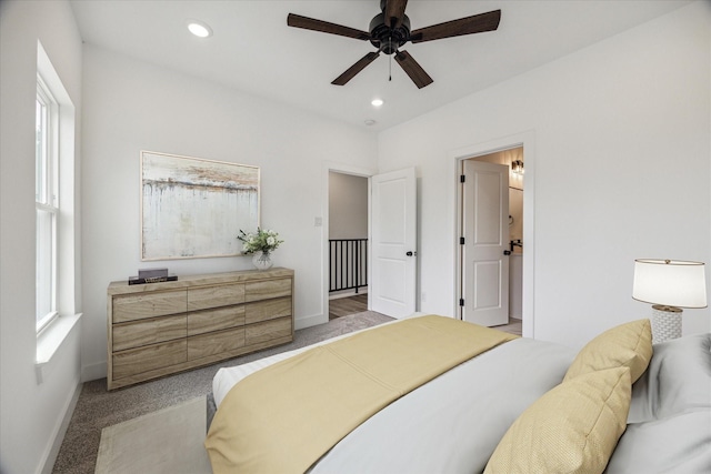 carpeted bedroom featuring ceiling fan, baseboards, and recessed lighting