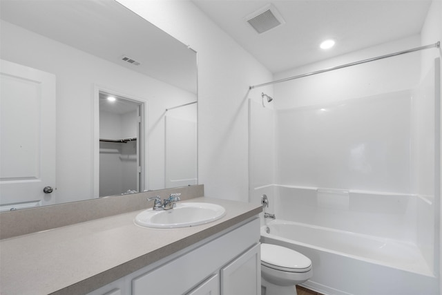 17594 Longwood Trace Ln, New Caney, TX 77357 - bathroom featuring toilet, shower / tub combination, vanity, recessed lighting, and a walk in closet