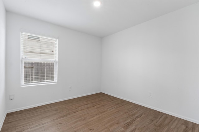 17594 Longwood Trace Ln, New Caney, TX 77357 - spare room featuring light wood-style flooring and baseboards