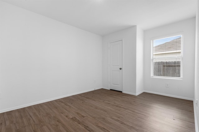 17594 Longwood Trace Ln, New Caney, TX 77357 - spare room with wood finished floors and baseboards