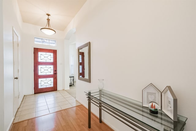 foyer entrance with light wood-style flooring