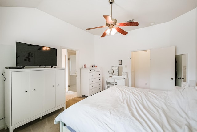 bedroom with lofted ceiling, ensuite bathroom, light colored carpet, a ceiling fan, and visible vents