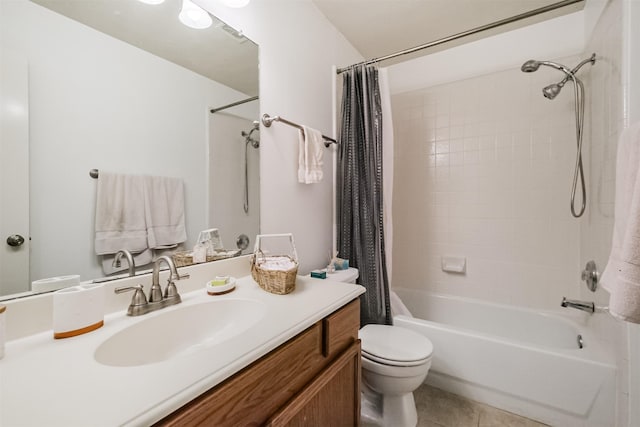 full bathroom featuring shower / bath combo, vanity, toilet, and tile patterned floors