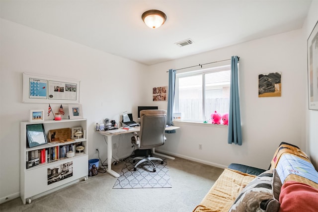 office area featuring carpet floors, visible vents, and baseboards