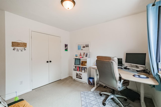 home office featuring light colored carpet