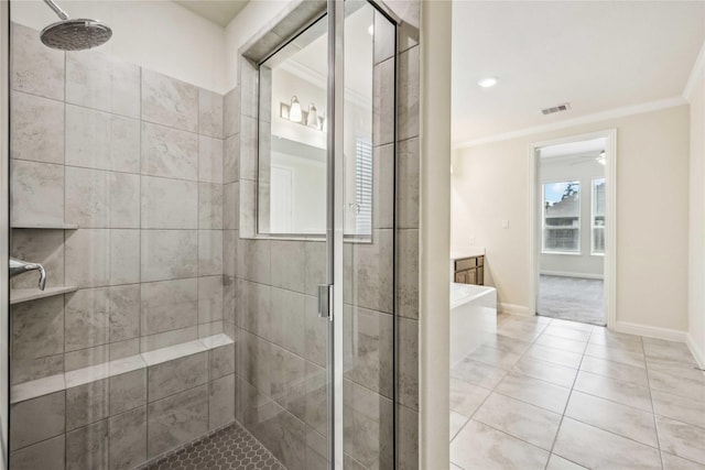 bathroom with visible vents, baseboards, ornamental molding, tile patterned floors, and a stall shower