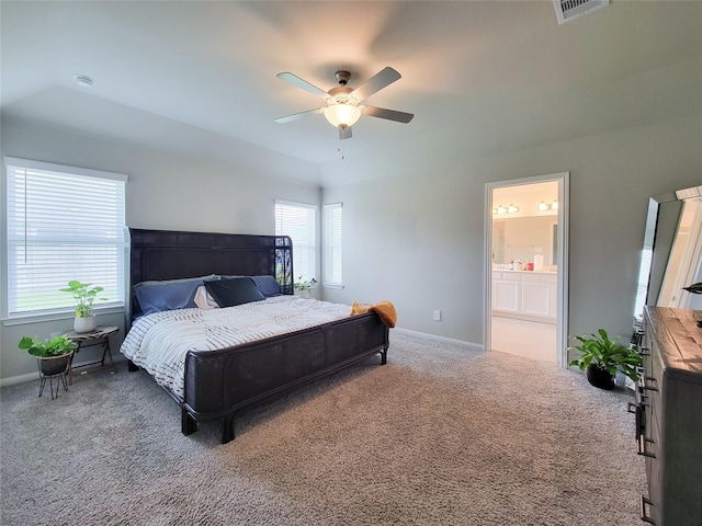 bedroom with a ceiling fan, carpet flooring, visible vents, and baseboards